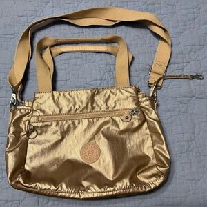 Kipling purse. Silvery Gold-metallic. Shoulder bag or crossbody.